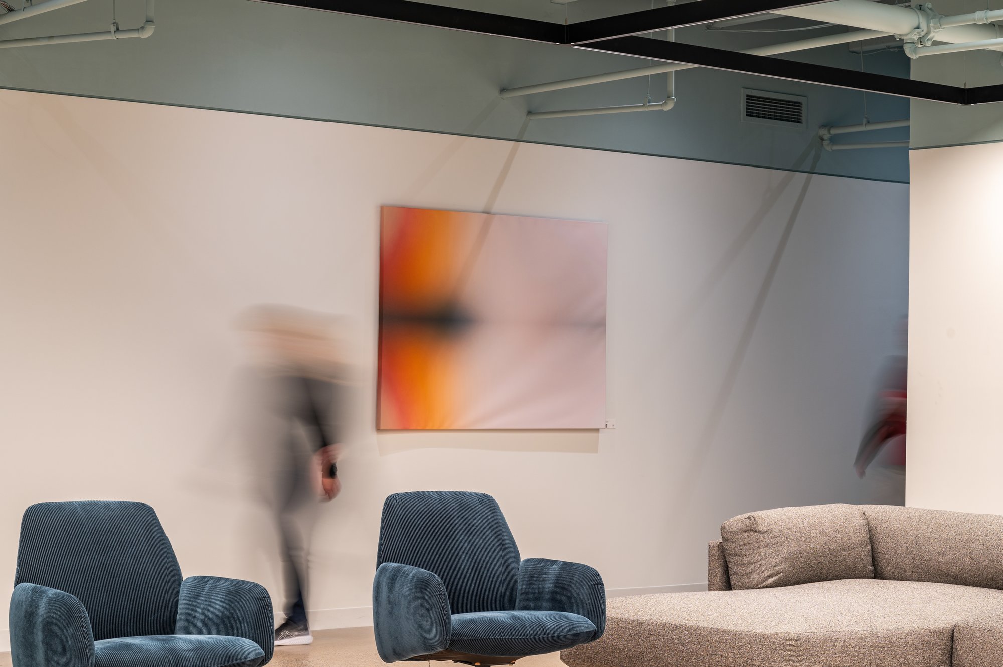 Artwork integrated into a professionally designed commercial interior.